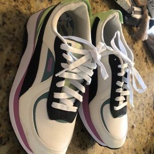 Women’s size 9 Puma Cruise Rider. Cream, black , lilac and green upper.